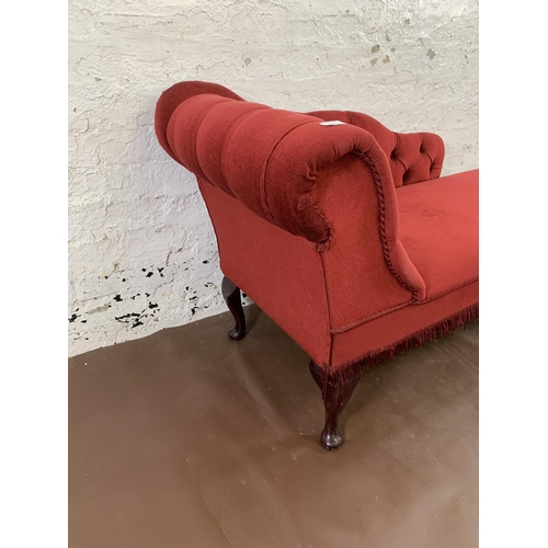 47 - A Victorian style red button back fabric upholstered chaise longue on cabriole supports - approx. 70... 