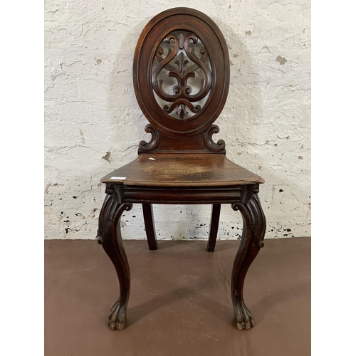 5 - A 19th century carved mahogany hall chair - approx. 92cm high x 44cm wide x 36cm deep