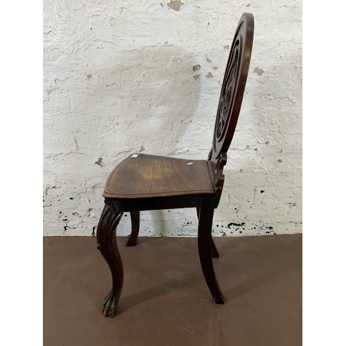 5 - A 19th century carved mahogany hall chair - approx. 92cm high x 44cm wide x 36cm deep