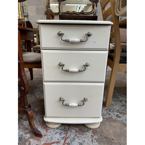 58 - A modern white painted bedside chest of drawers