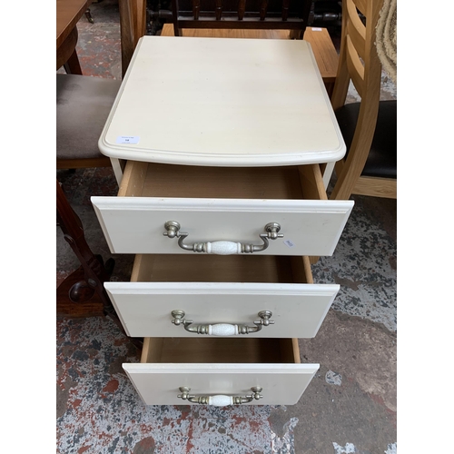 58 - A modern white painted bedside chest of drawers