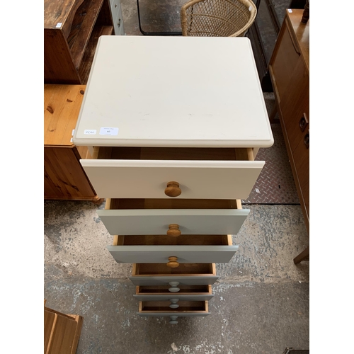 60 - Two modern painted pine bedside chests of drawers