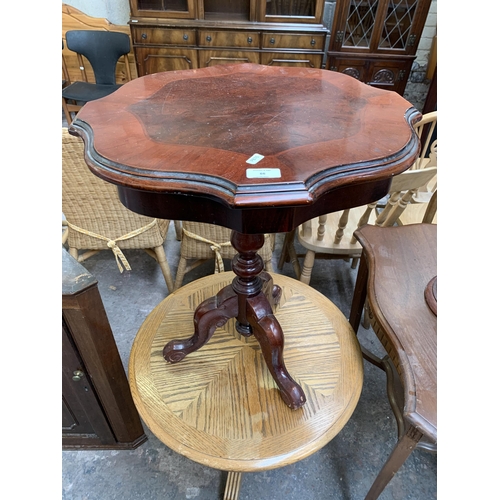 66 - Four pieces of furniture, one Edwardian carved mahogany serpentine two tier side table, one Italian ... 