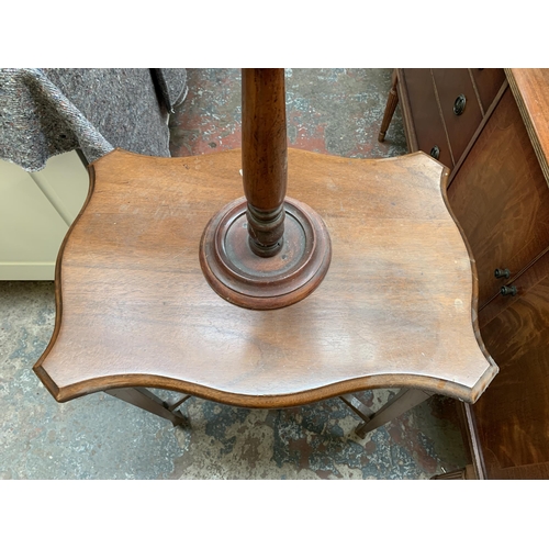 66 - Four pieces of furniture, one Edwardian carved mahogany serpentine two tier side table, one Italian ... 