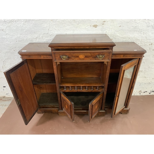 69 - A late 19th/early 20th century inlaid walnut sideboard with two mirrored cupboard doors - approx. 92... 