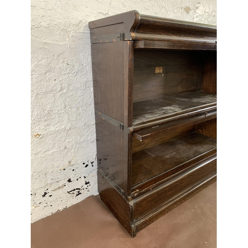 71 - An early 20th century Globe-Wernicke oak two section stacking bookcase - approx. 89cm high x 87cm wi... 