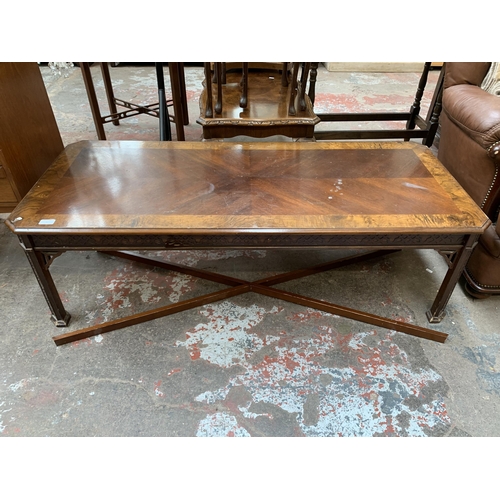 76 - A Georgian style carved mahogany and burr walnut coffee table