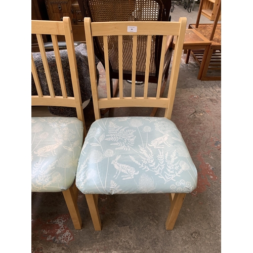 84 - Two pairs of modern beech dining chairs