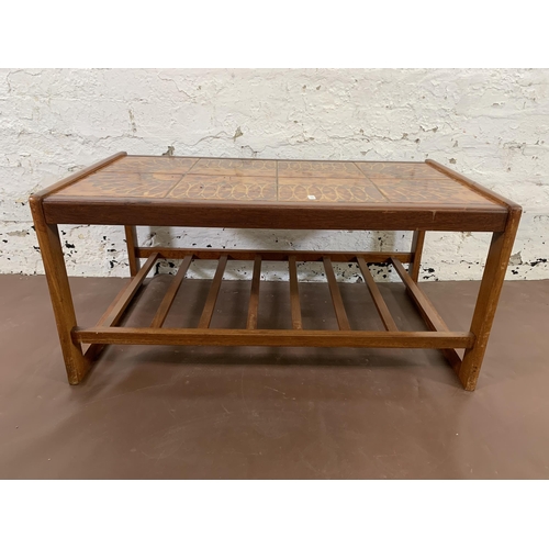 86 - Three mid 20th century teak and ceramic tile top occasional tables - largest approx. 40cm high x 47c... 