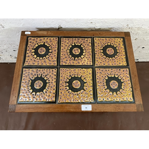 86 - Three mid 20th century teak and ceramic tile top occasional tables - largest approx. 40cm high x 47c... 