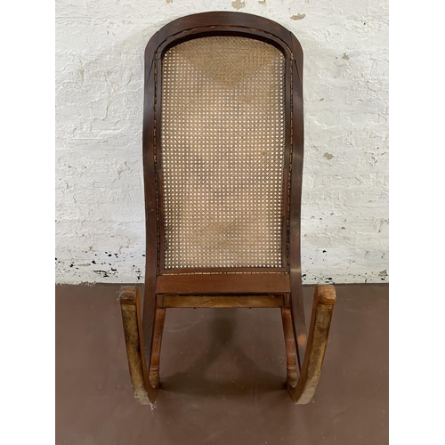 88 - A Victorian mahogany and cane 'Lincoln' rocking chair