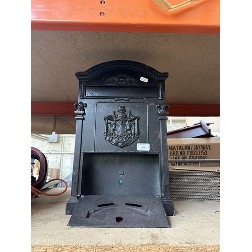 918 - A Victorian style black painted metal wall hanging letterbox - approx. 46cm high x 29.5cm wide