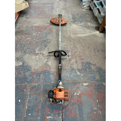 940 - A Stihl petrol garden grass strimmer