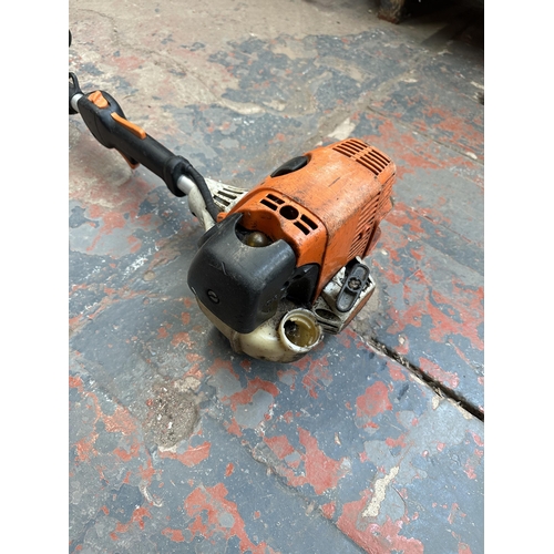 940 - A Stihl petrol garden grass strimmer