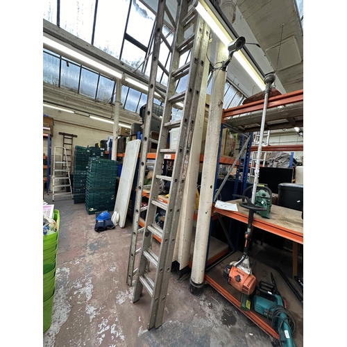 944 - Two pairs of aluminium ladders, one 26 rung and one 14 rung