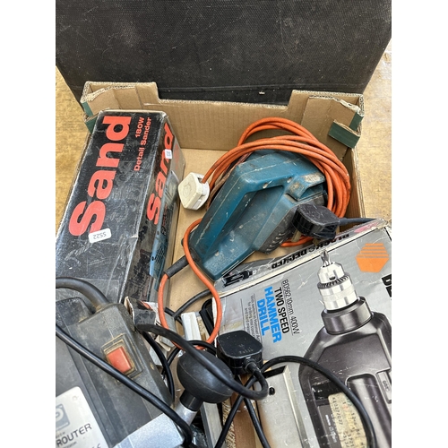 964 - A quantity of power tools to include Performance FMTCIO2OR router, Black & Decker two-speed hammer d... 