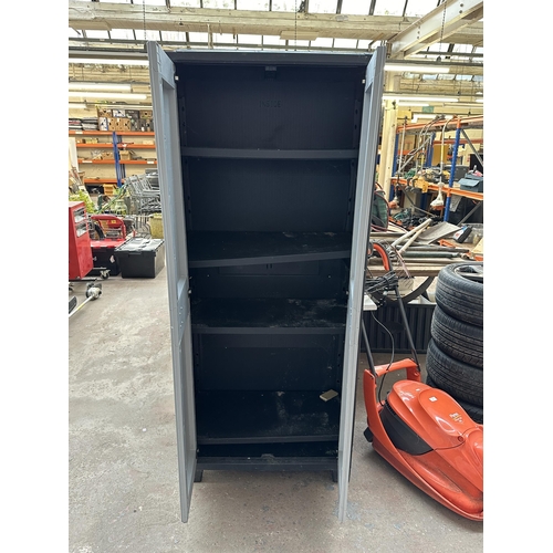 973 - A plastic two door garage storage cabinet - approx. 181cm high x 78cm wide x 43cm deep