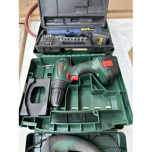 977 - Three cased power tools, Bosch PST650 jigsaw, Bosch PSR12 cordless drill and Power Craft PSD-480K sc... 