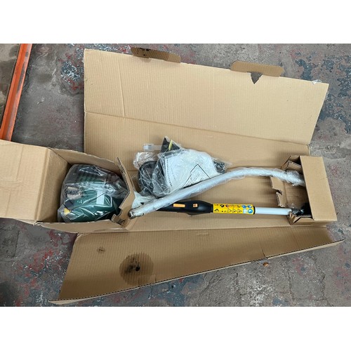 931 - A boxed B&Q 25cc petrol grass strimmer