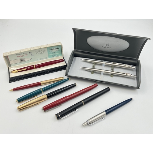 2059 - Nine writing instruments to include boxed Parker two piece set, boxed Parker 51 red lacquered founta... 