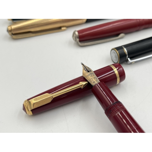 2059 - Nine writing instruments to include boxed Parker two piece set, boxed Parker 51 red lacquered founta... 