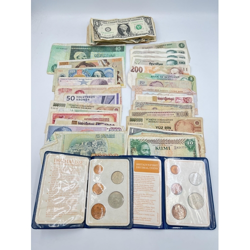 2068 - A collection of world banknotes to include Central Bank of Kenya, United Arab Emirates Central Bank,... 