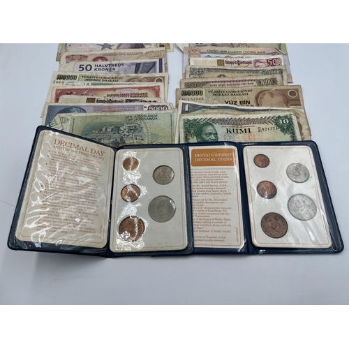 2068 - A collection of world banknotes to include Central Bank of Kenya, United Arab Emirates Central Bank,... 