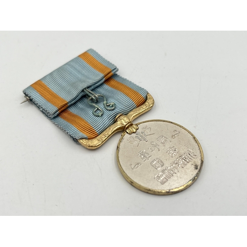 2142 - A second class Japanese sea disaster rescue society merit medal