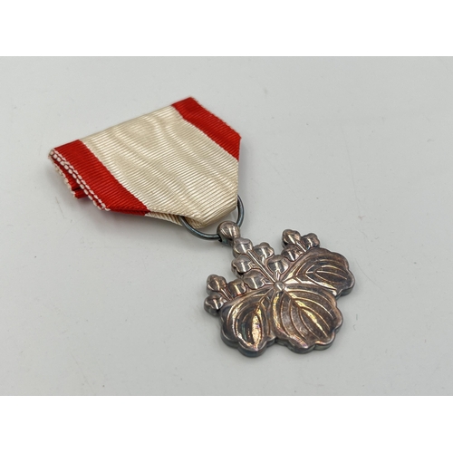 2143 - A WWII Japanese Order of the Rising Sun 8th class medal