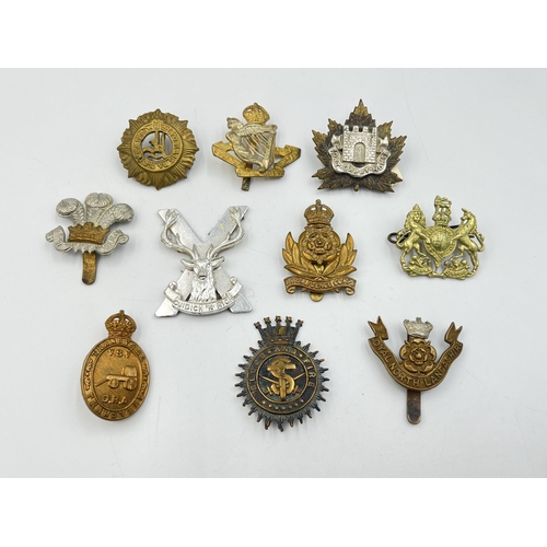 2150 - Ten military cap badges