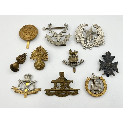 2151 - Ten military cap badges