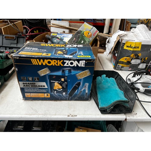 976A - A boxed WorkZone 61893 80amp arc welder with mask and gloves