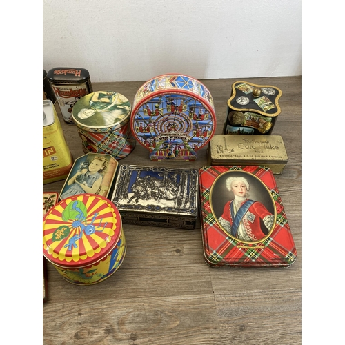 407 - A collection of vintage tins to include Huntley & Palmers, Furniss Humbugs etc.