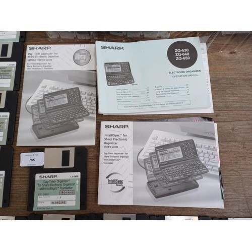 807 - A boxed Sharp ZQ-650 1mb electronic organizer and CE-60K organizer link with ten floppy discs