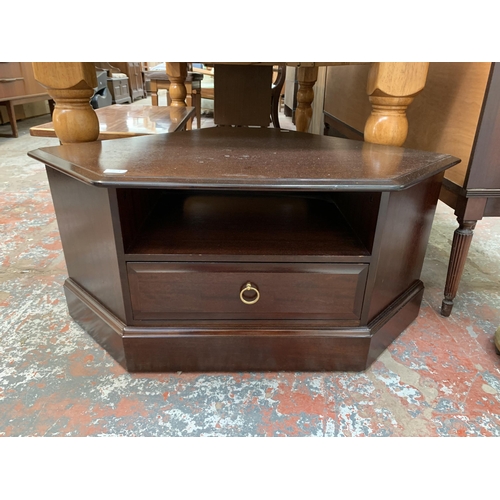 78 - A Stag Minstrel mahogany corner TV stand