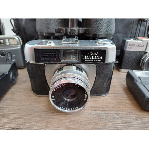 630 - A camera bag containing Polaroid 636 Talking instant camera, cased Haking Halina Paulette Electric 3... 