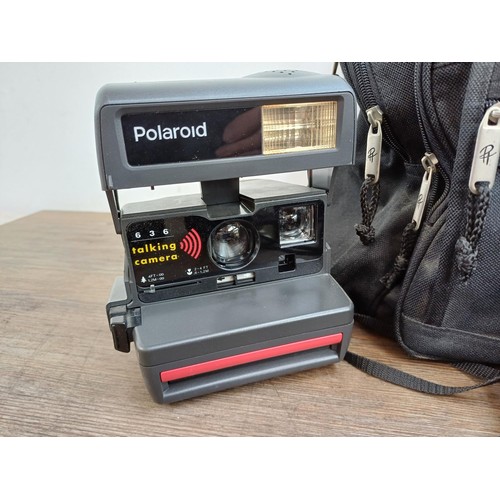 630 - A camera bag containing Polaroid 636 Talking instant camera, cased Haking Halina Paulette Electric 3... 