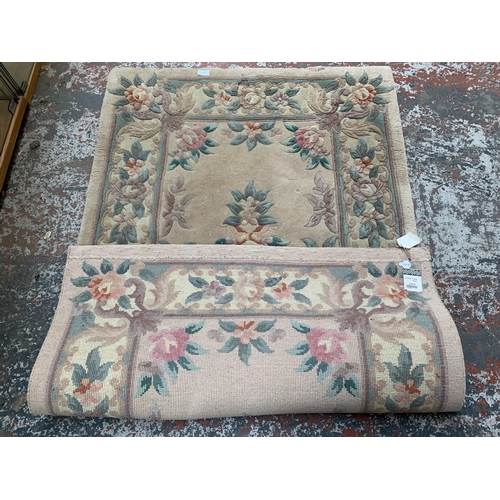 243C - A Chinese floral pattern rug - approx. 5ft x 3ft