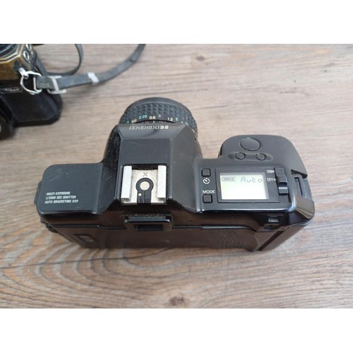 631 - Three Ricoh 35mm SLR cameras, one XR-X fitted with Rikenon 1:3.4-4.5 35-70mm P macro zoom lens, one ... 