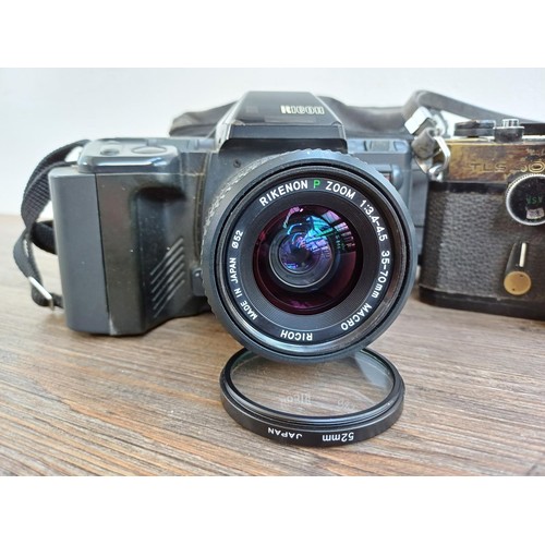 631 - Three Ricoh 35mm SLR cameras, one XR-X fitted with Rikenon 1:3.4-4.5 35-70mm P macro zoom lens, one ... 