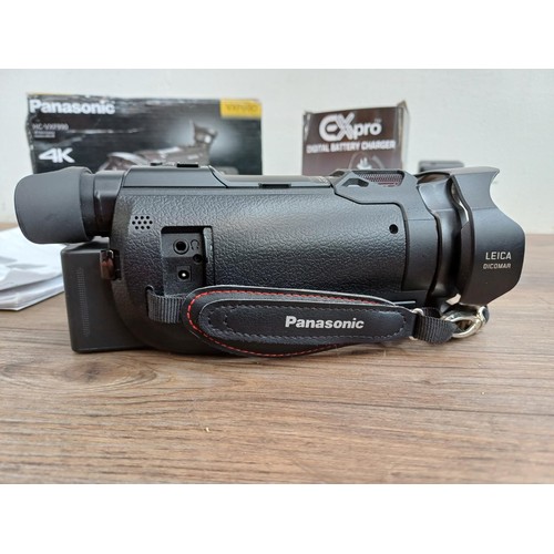 635 - A boxed Panasonic HC-VXF990 4K wi-fi digital camcorder with batteries, charger and instruction manua... 