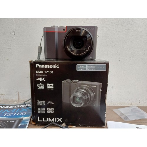 637 - A boxed Panasonic TZ100 20.1mp 4K wi-fi digital camera with charger and instruction manual