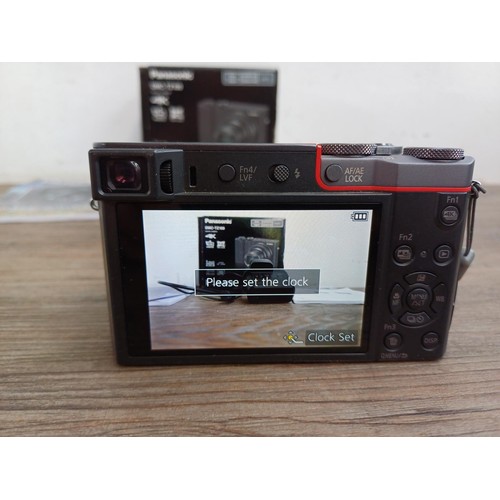 637 - A boxed Panasonic TZ100 20.1mp 4K wi-fi digital camera with charger and instruction manual