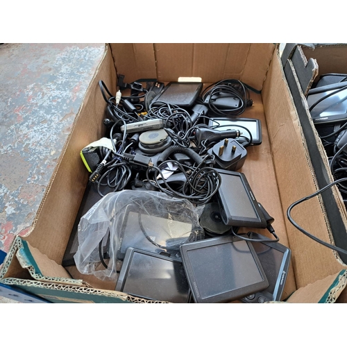 774 - Three boxes containing a large collection of boxed and unboxed SatNavs to include TomTom, Garmin, Na... 