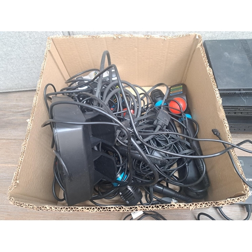 789 - Three Sony PlayStation 2 consoles, one SCPH-30003, one SCPH-30003 R and one SCPH-77003 slim with gam... 