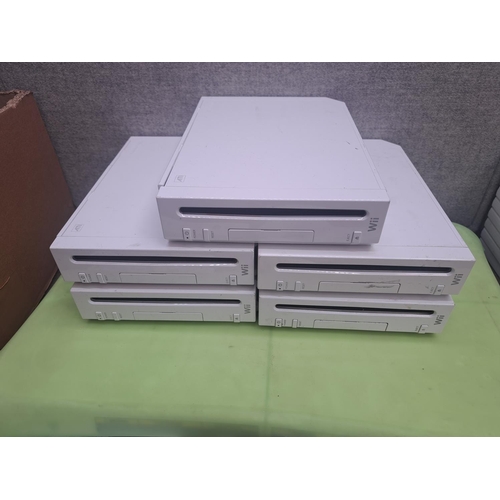 795 - Five Nintendo Wii consoles with Wii Fit board, controllers, games and accessories etc.