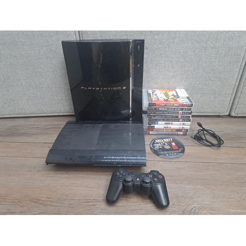 796 - Two Sony PlayStation 3 consoles, one CECHC03 and one CECH-4003C with DualShock 3 controller and game... 