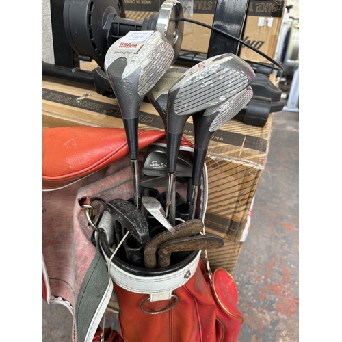 862 - A vintage Spalding golf bag containing clubs to include Wilson, PGA, Diamond etc.