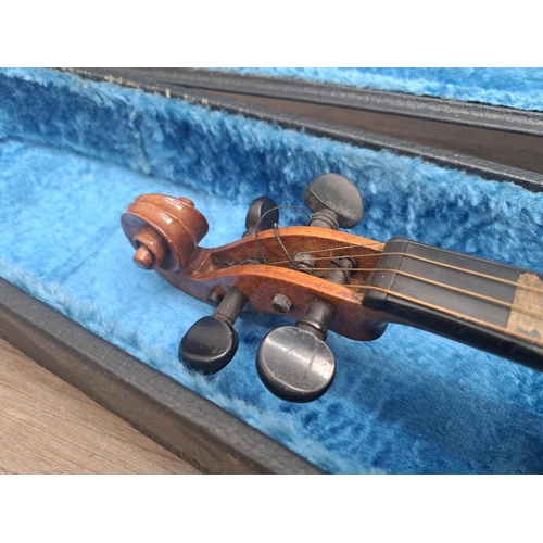 759 - A cased vintage full size violin with bow (bow A/F)