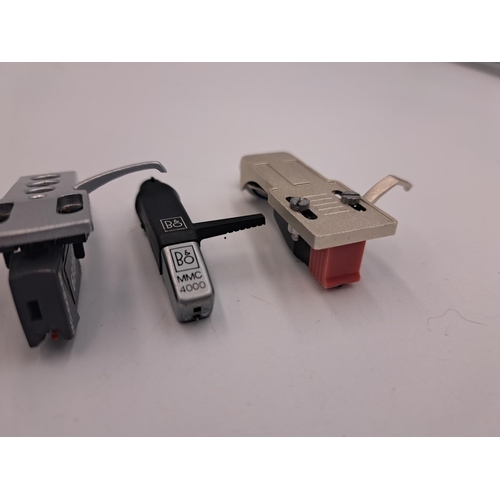 699 - Four headshells with cartridges, one Bang & Olufsen  MMC-SME adapter with MMC4000 cartridge (A/F), o... 